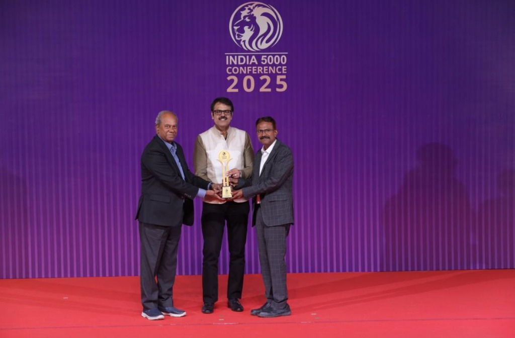 Receiving Award at India 5000 Conference